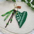 Charm Mela Po’o – Cuore in Bandana Verde bottiglia