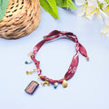 Collana Bandana bordeaux con Charms dorati – Pezzo Unico